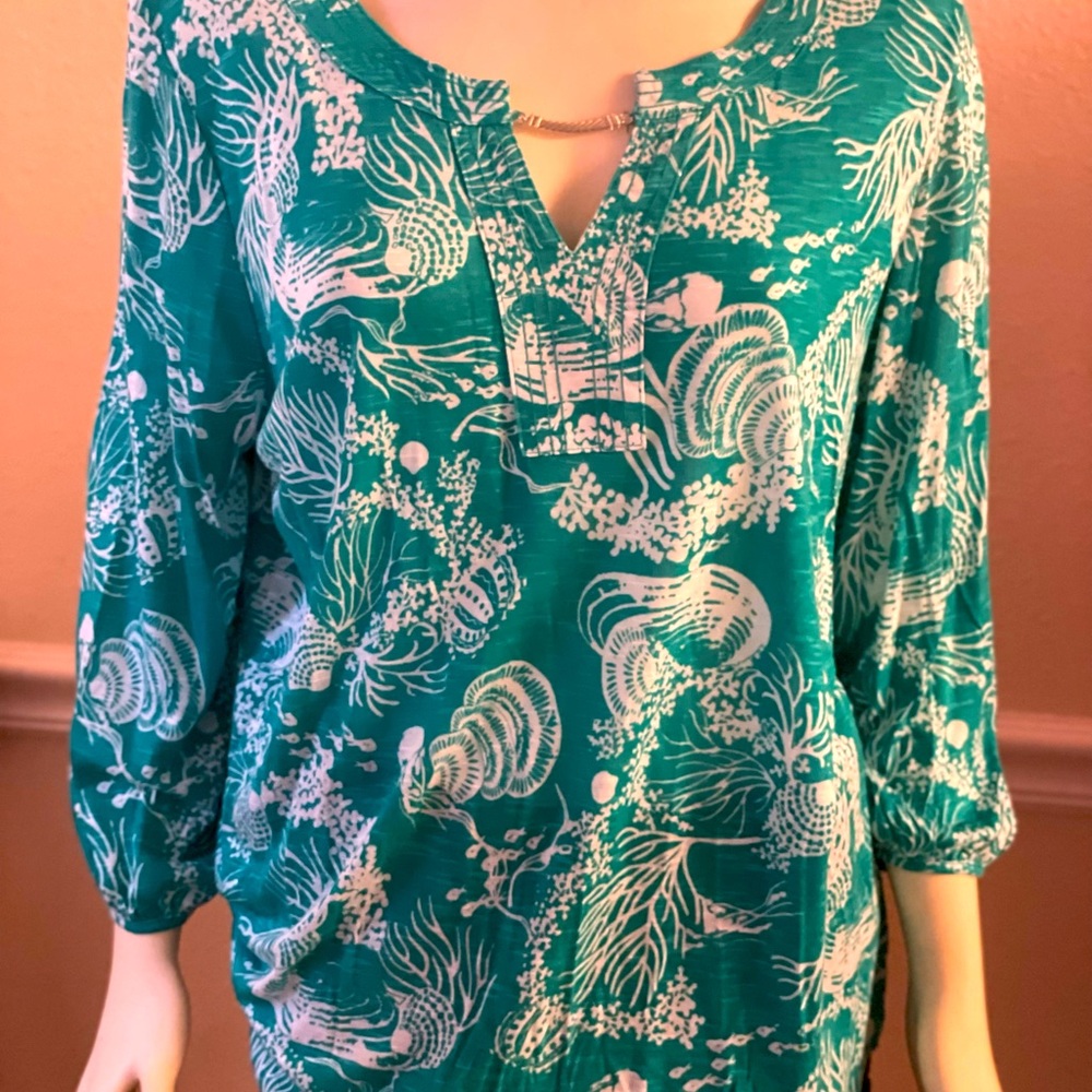 Cast Key teal beach resort top